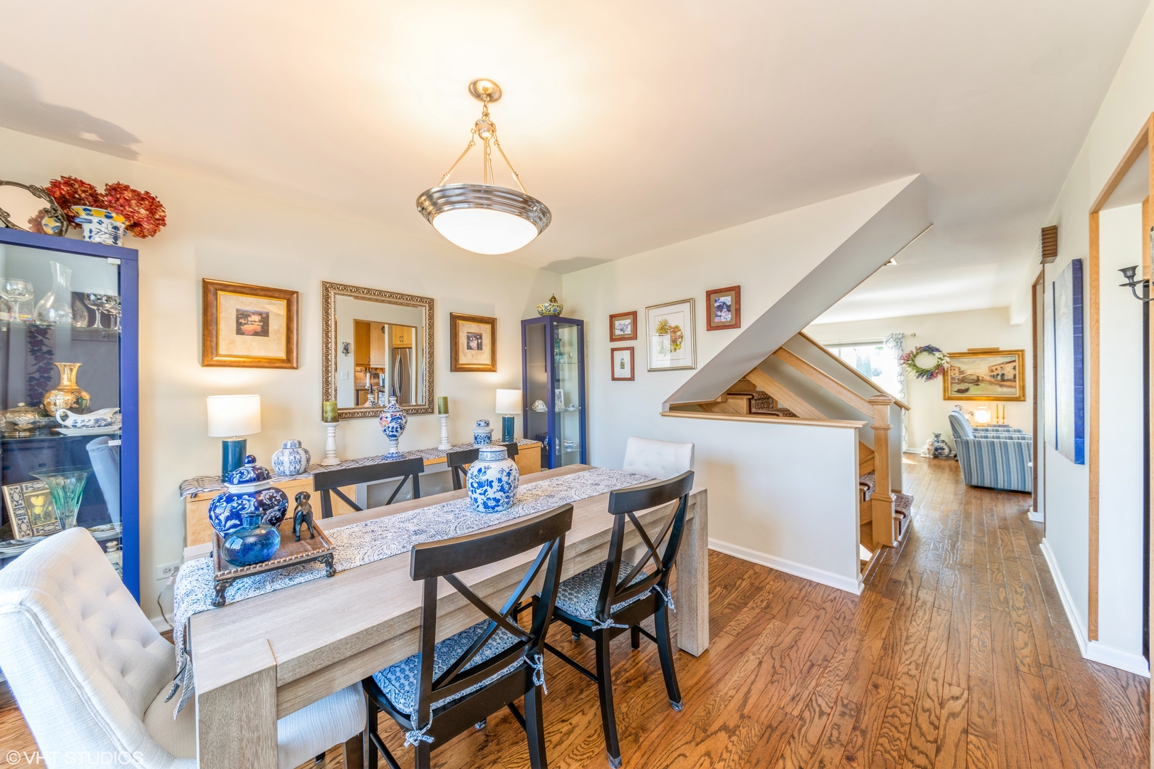 629 High Ridge Road Roselle, IL 60172 - Photo 6 of 20 a view of a dining room with furniture and wooden floor