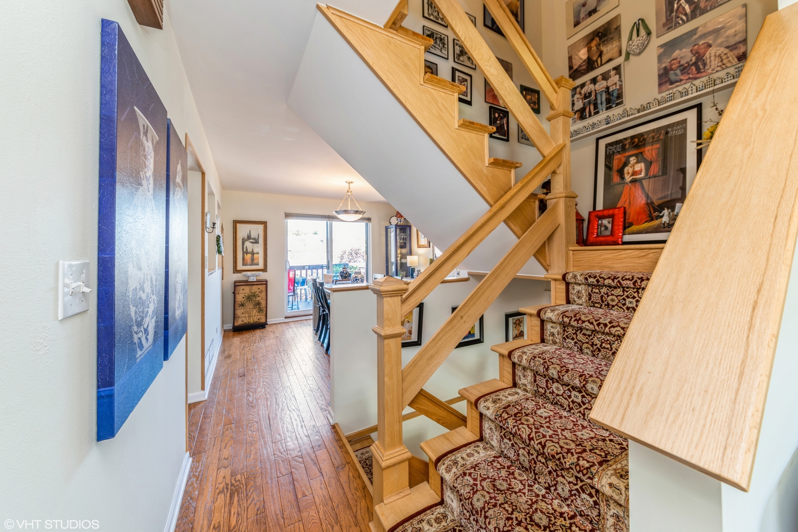 629 High Ridge Road Roselle, IL 60172 - Photo 8 of 20 a view of entryway and hall with wooden floor
