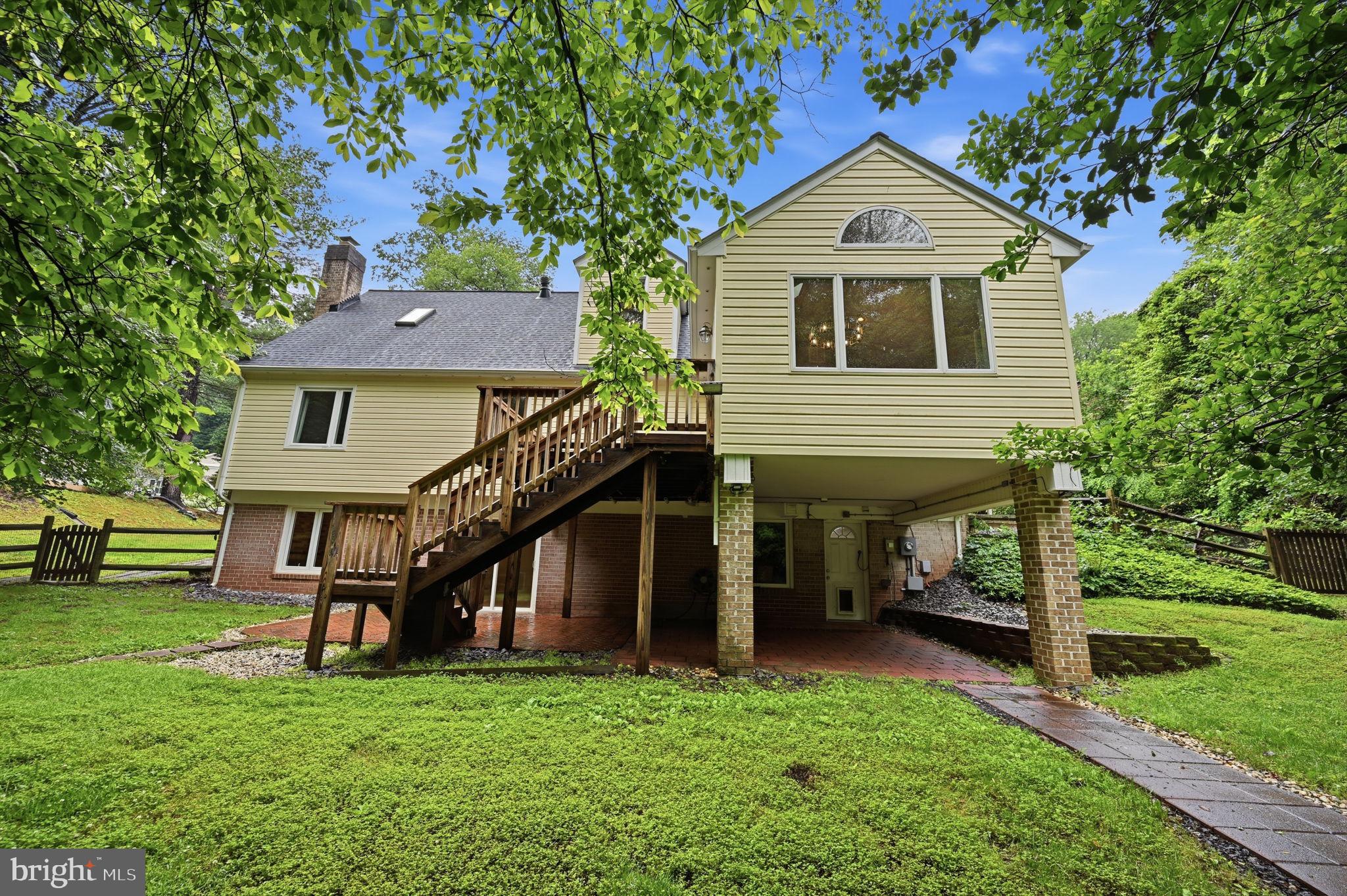 2506 Pinoak Lane Reston, VA 20191 - Photo 28 of 33 a view of a house with a yard and sitting area