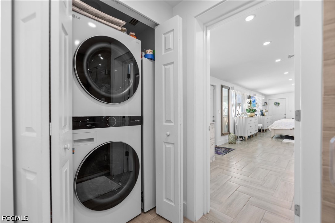 1200 Patterson Road Cape Coral, FL 33909 - Photo 29 of 42 a view of a hallway with washer and dryer