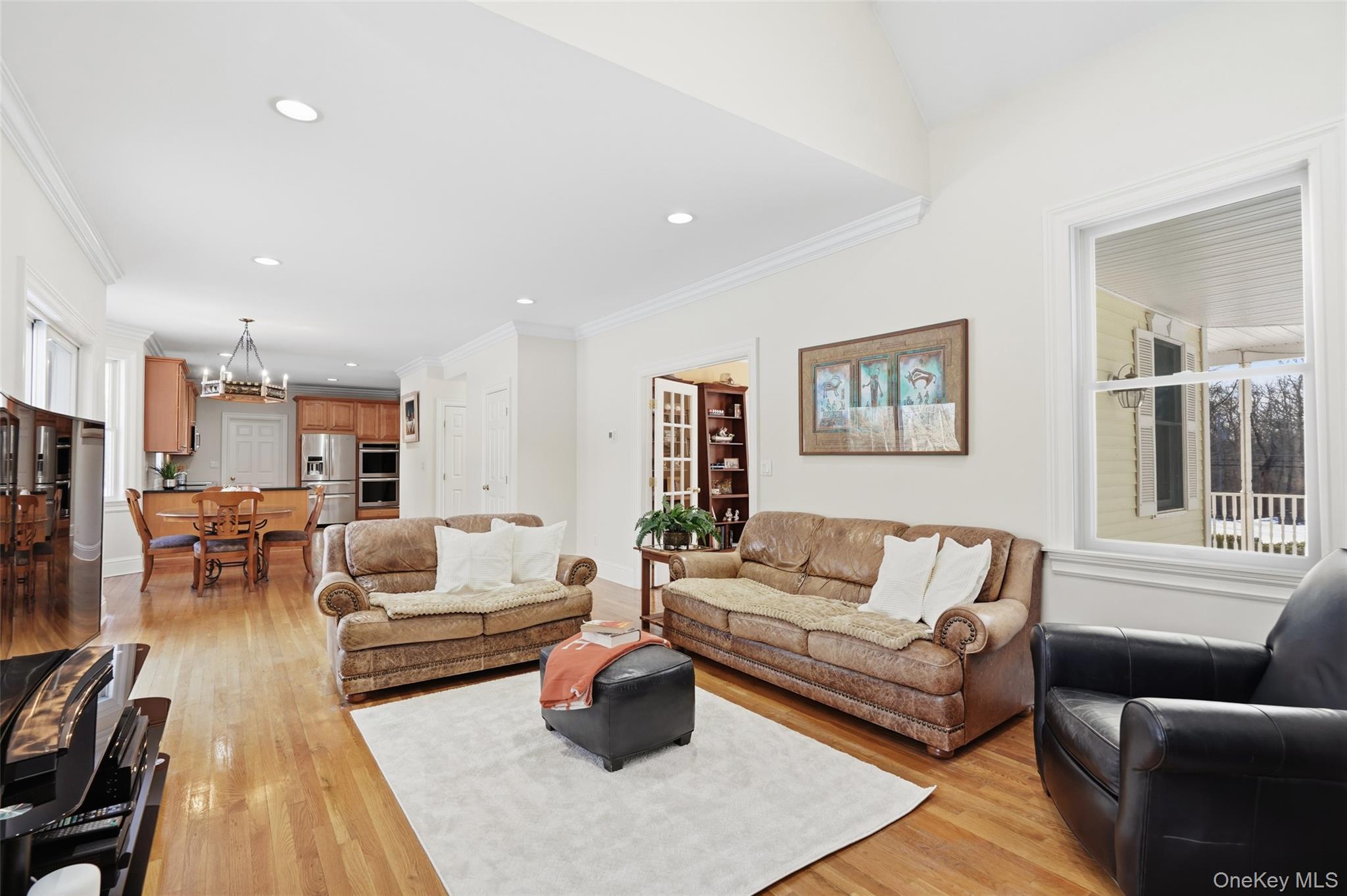 127 Smith Ridge Road South Salem, NY 10590 - Photo 12 of 49 a living room with furniture wooden floor and a large window