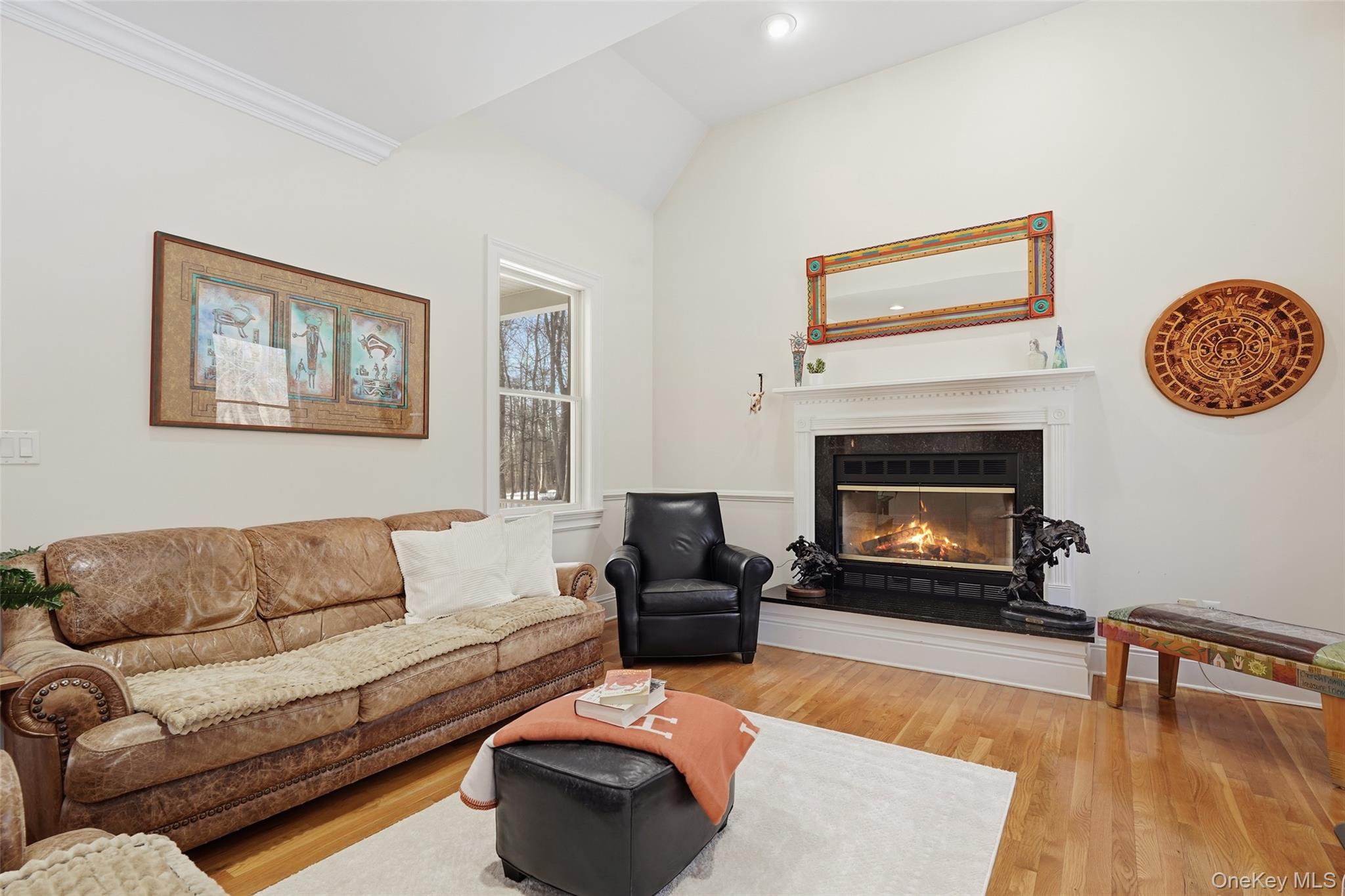 127 Smith Ridge Road South Salem, NY 10590 - Photo 13 of 49 a living room with furniture and a fireplace