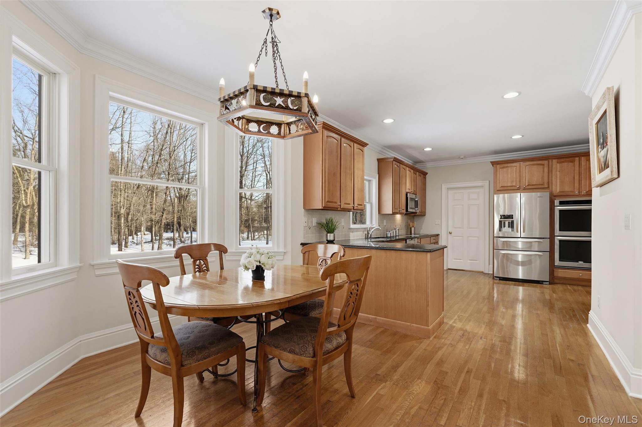 127 Smith Ridge Road South Salem, NY 10590 - Photo 15 of 49 a view of a dining room with furniture window and wooden floor