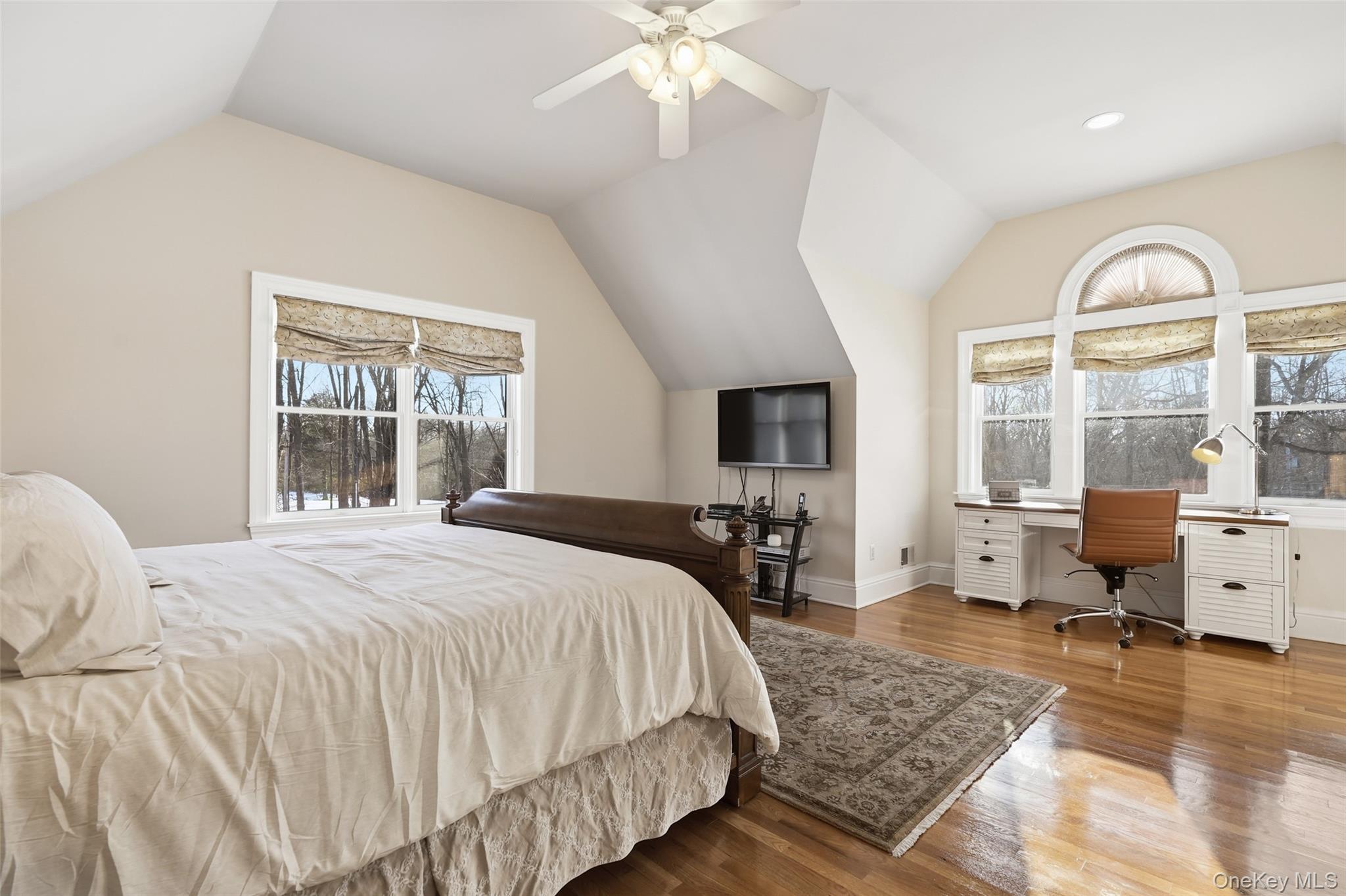 127 Smith Ridge Road South Salem, NY 10590 - Photo 25 of 49 a bedroom with a large bed and wooden floor