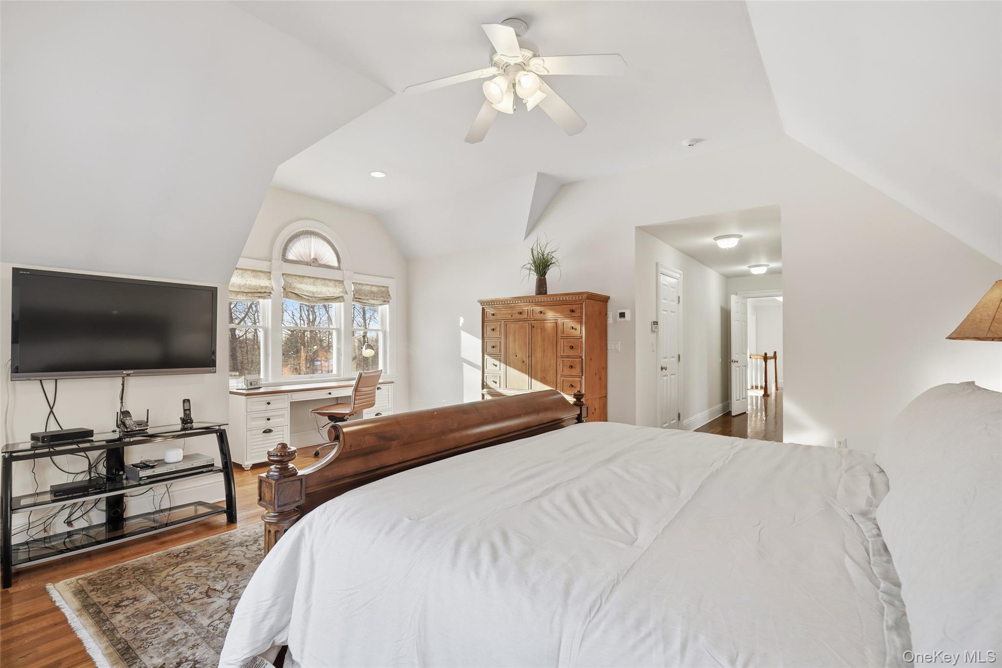 127 Smith Ridge Road South Salem, NY 10590 - Photo 26 of 49 a bedroom with a bed and a flat screen tv