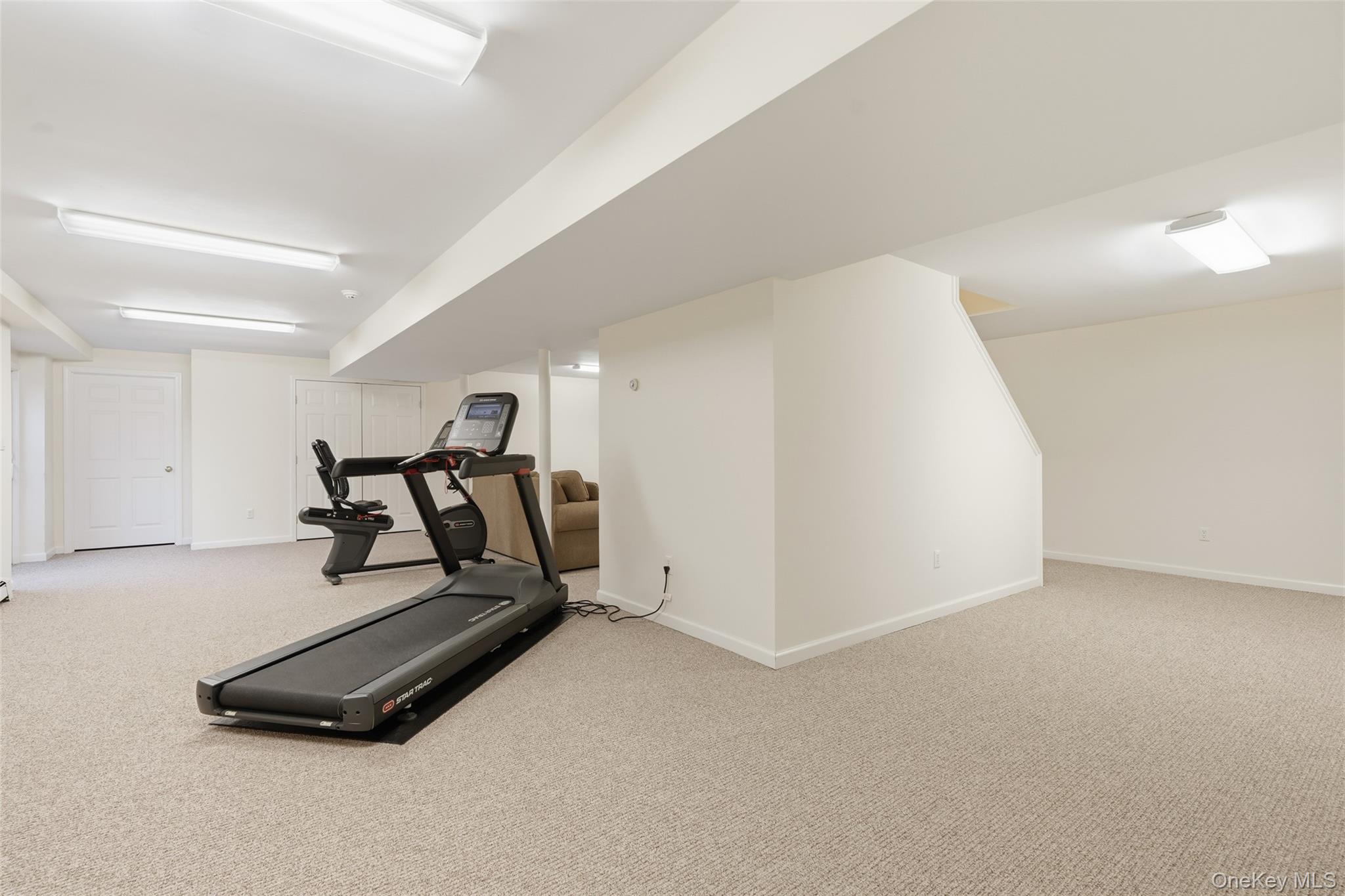 127 Smith Ridge Road South Salem, NY 10590 - Photo 35 of 49 a view of a room with gym equipment