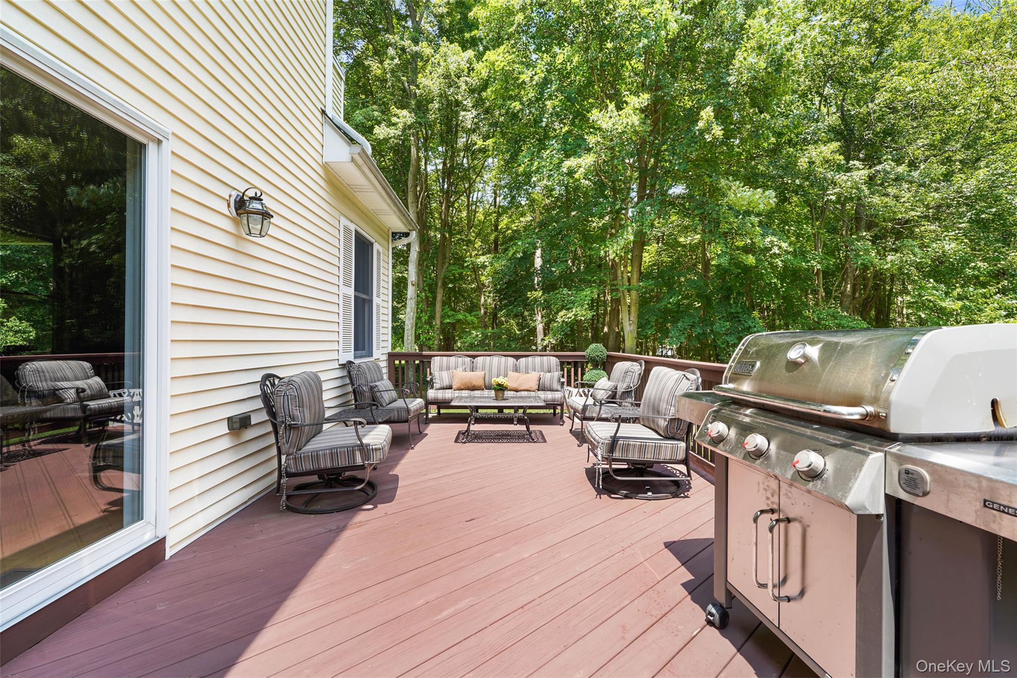 127 Smith Ridge Road South Salem, NY 10590 - Photo 37 of 49 a view of a patio with table and chairs and couches