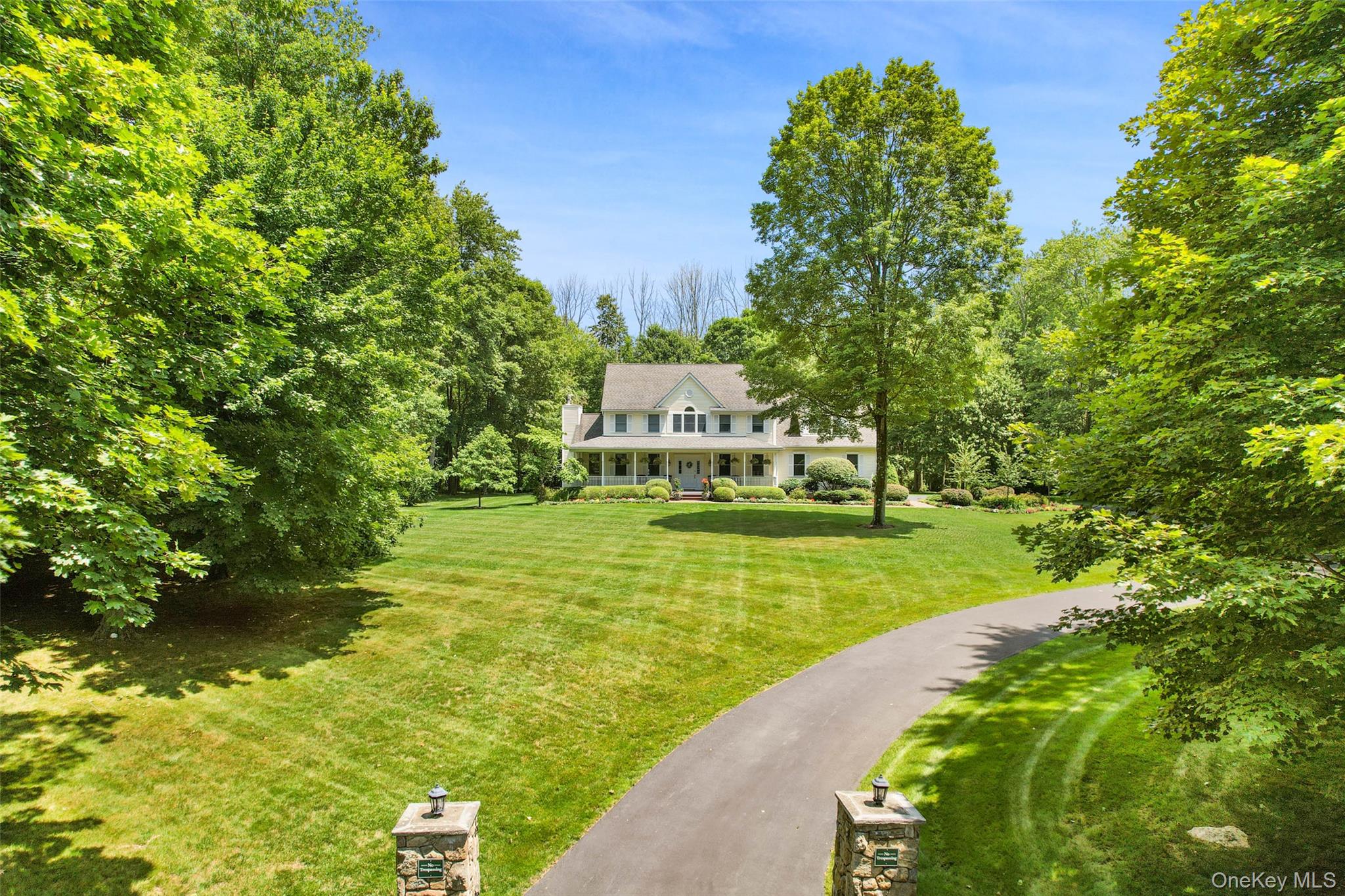 127 Smith Ridge Road South Salem, NY 10590 - Photo 4 of 49 a view of a lake with houses