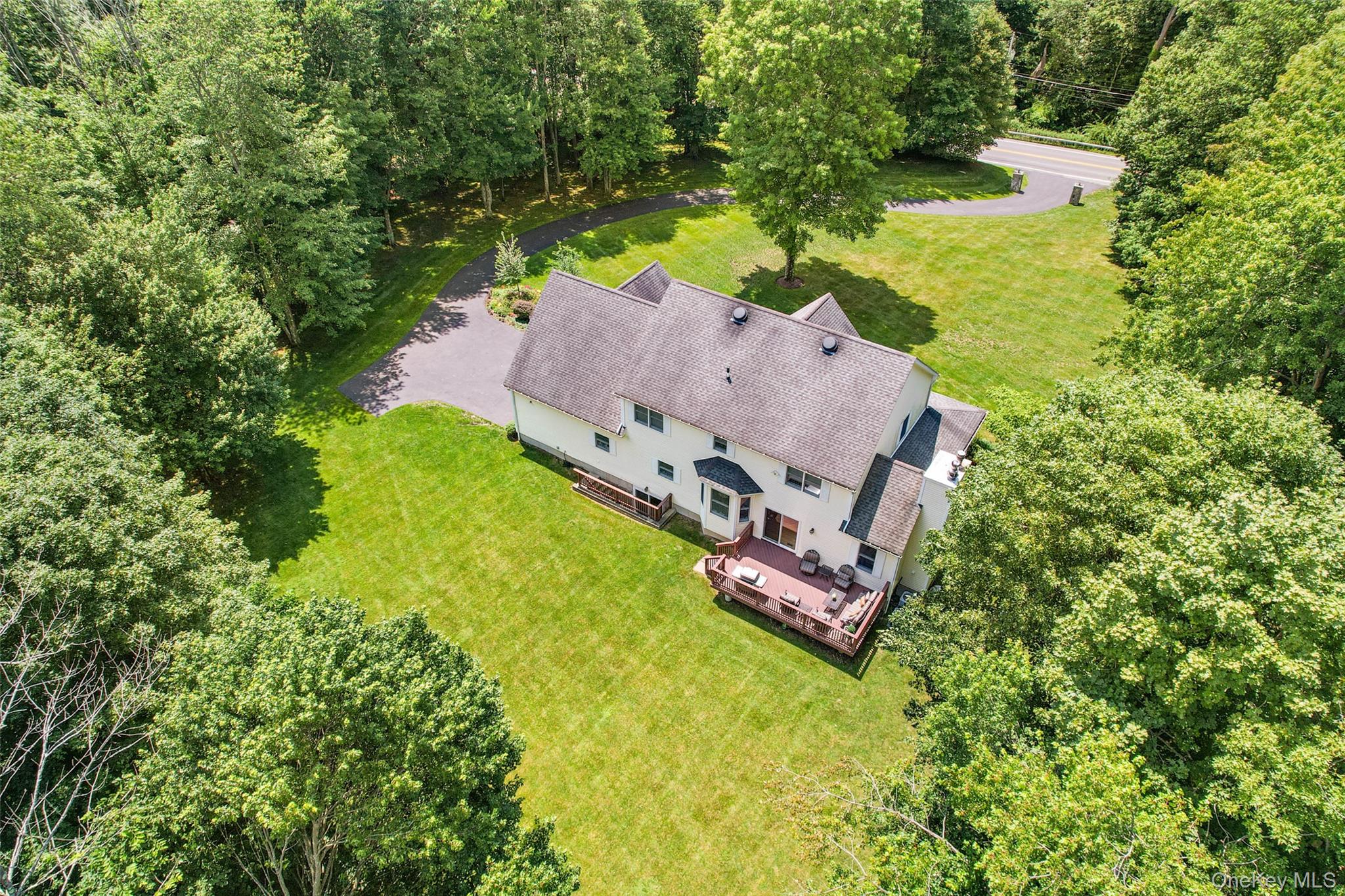 127 Smith Ridge Road South Salem, NY 10590 - Photo 43 of 49 an aerial view of a house with a garden and swimming pool