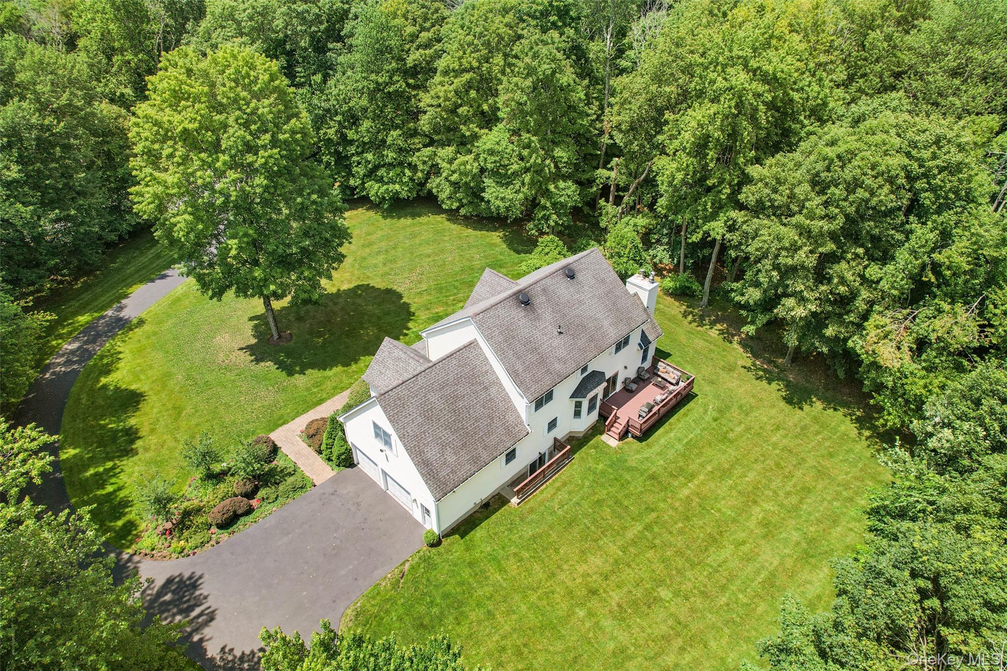 127 Smith Ridge Road South Salem, NY 10590 - Photo 46 of 49 an aerial view of a house with a yard and a garden
