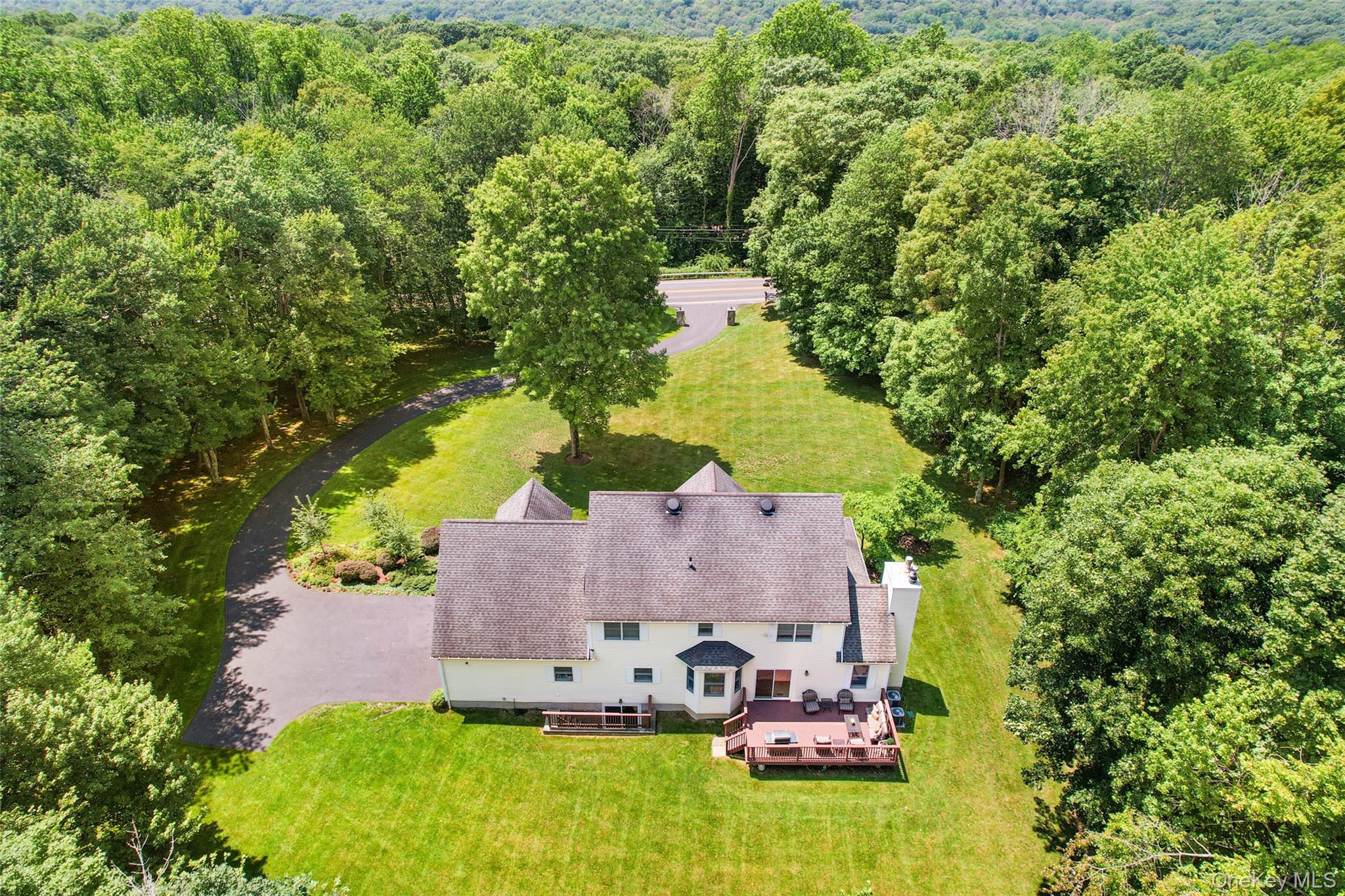 127 Smith Ridge Road South Salem, NY 10590 - Photo 5 of 49 an aerial view of a house with yard swimming pool and outdoor seating