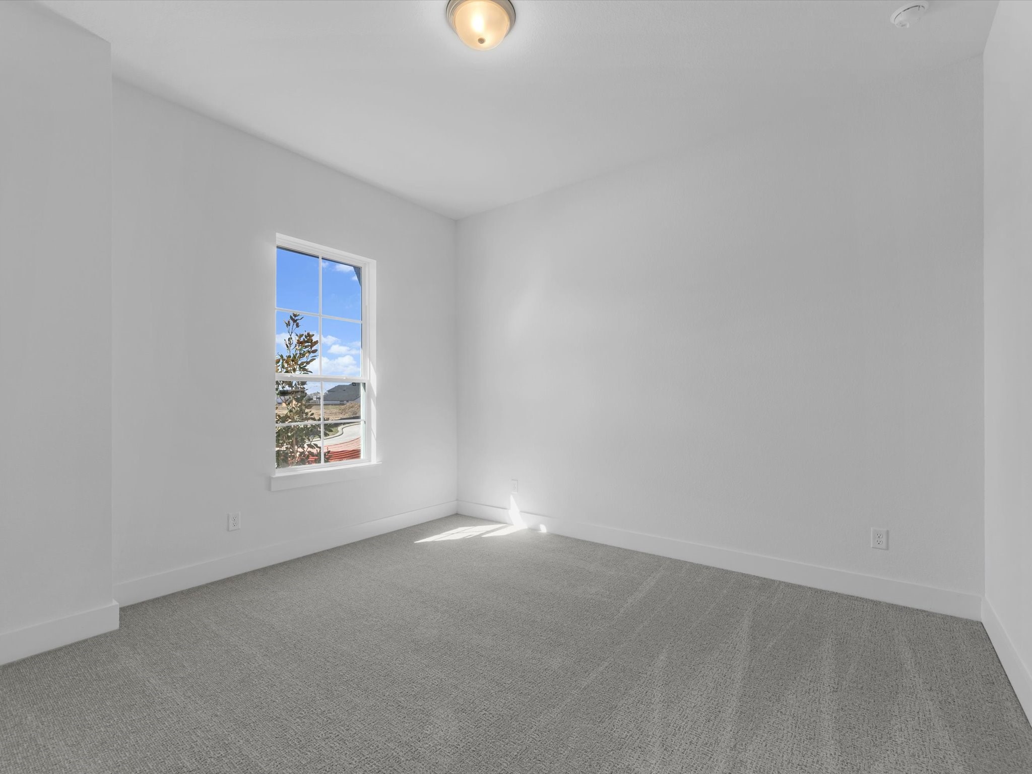 8011 Sunny Rdg Drive Fulshear, TX 77441 - Photo 14 of 32 a view of an empty room with a window