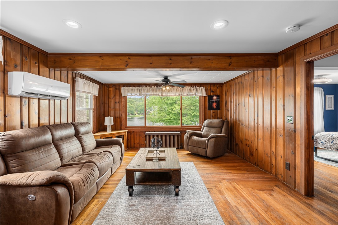 26 Acres Of Pine Road Coventry, RI 02816 - Photo 4 of 36 Front to back living room with pond view