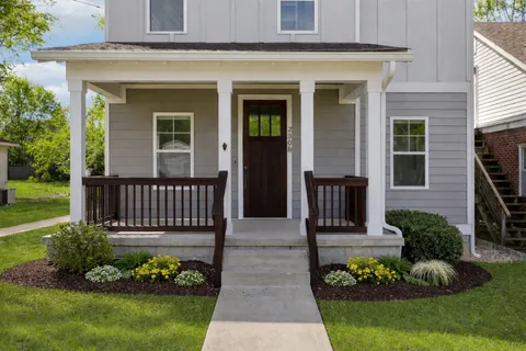 front view of a house with a small yard