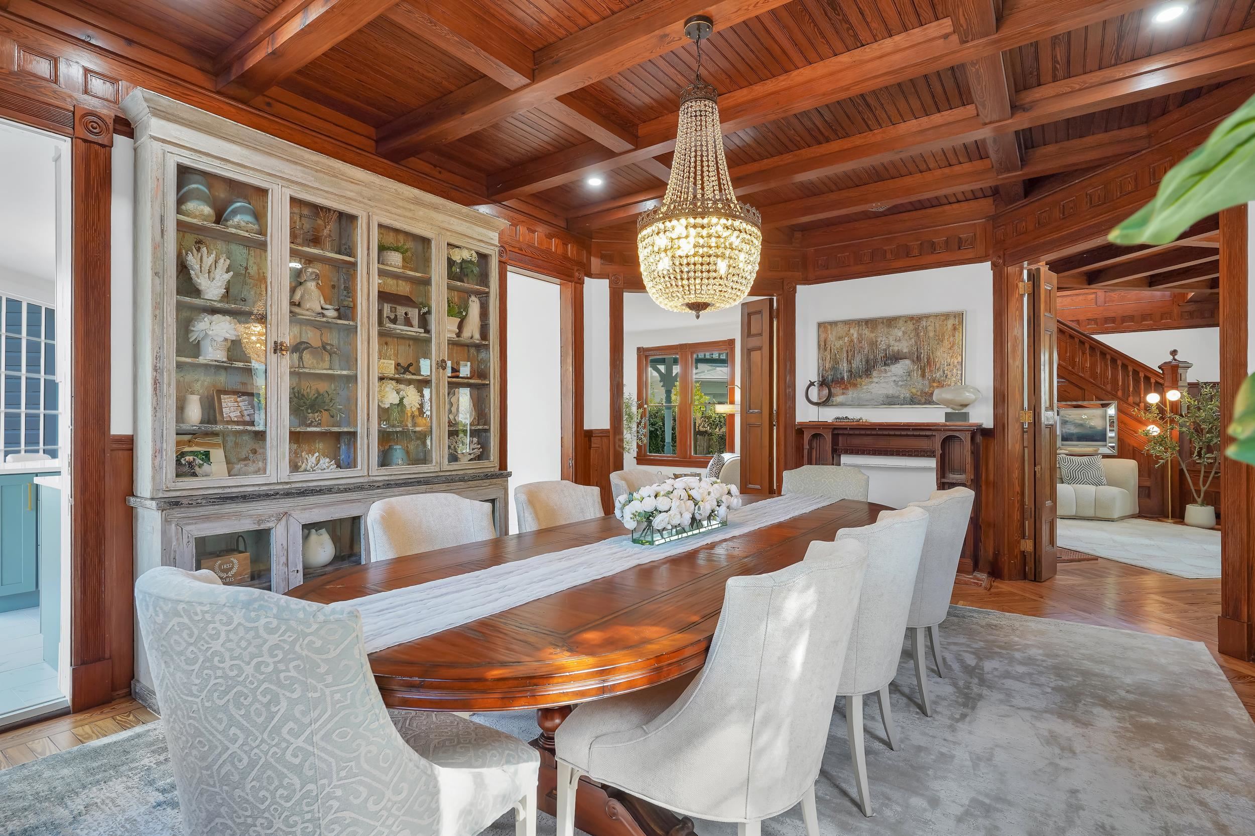 268 St George Street St. Augustine, FL 32084 - Photo 21 of 71 a dining room with furniture a chandelier and wooden floor