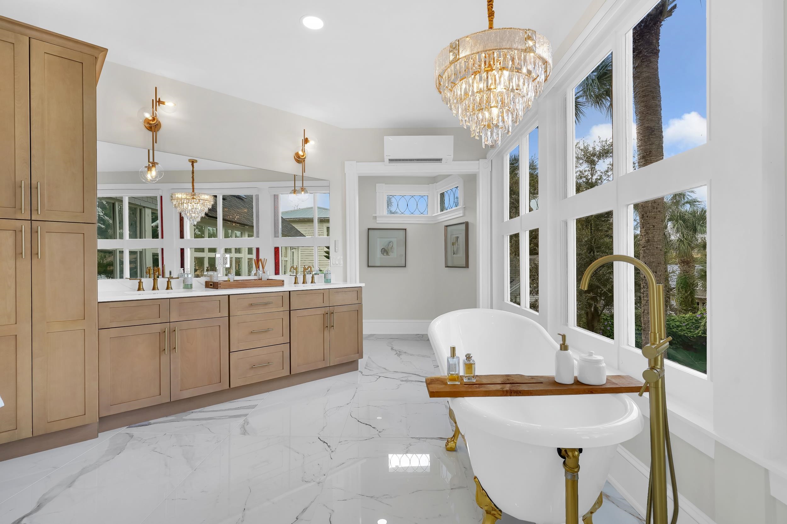 268 St George Street St. Augustine, FL 32084 - Photo 29 of 71 a living room with furniture and chandelier