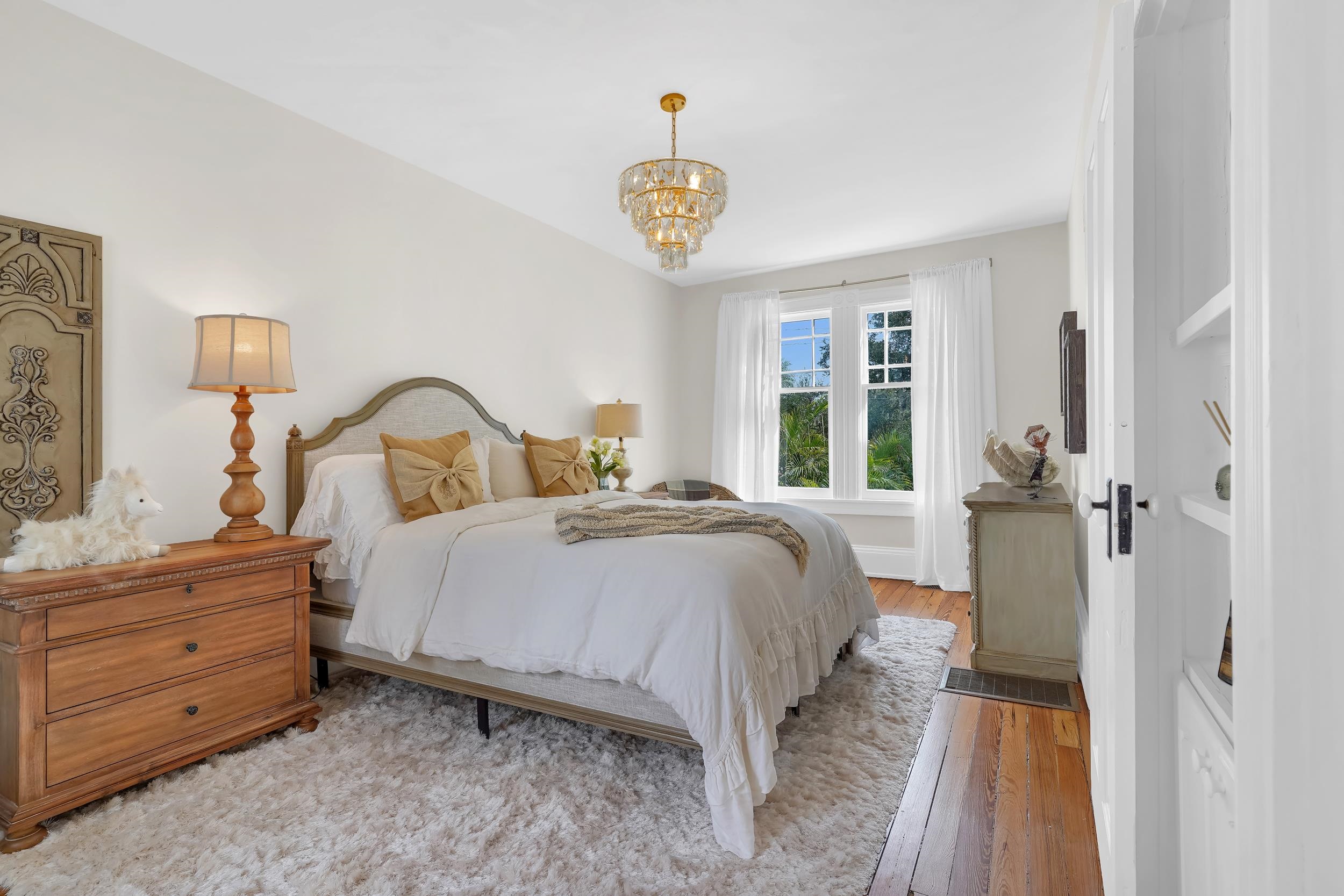 268 St George Street St. Augustine, FL 32084 - Photo 34 of 71 a bedroom with a bed and a window