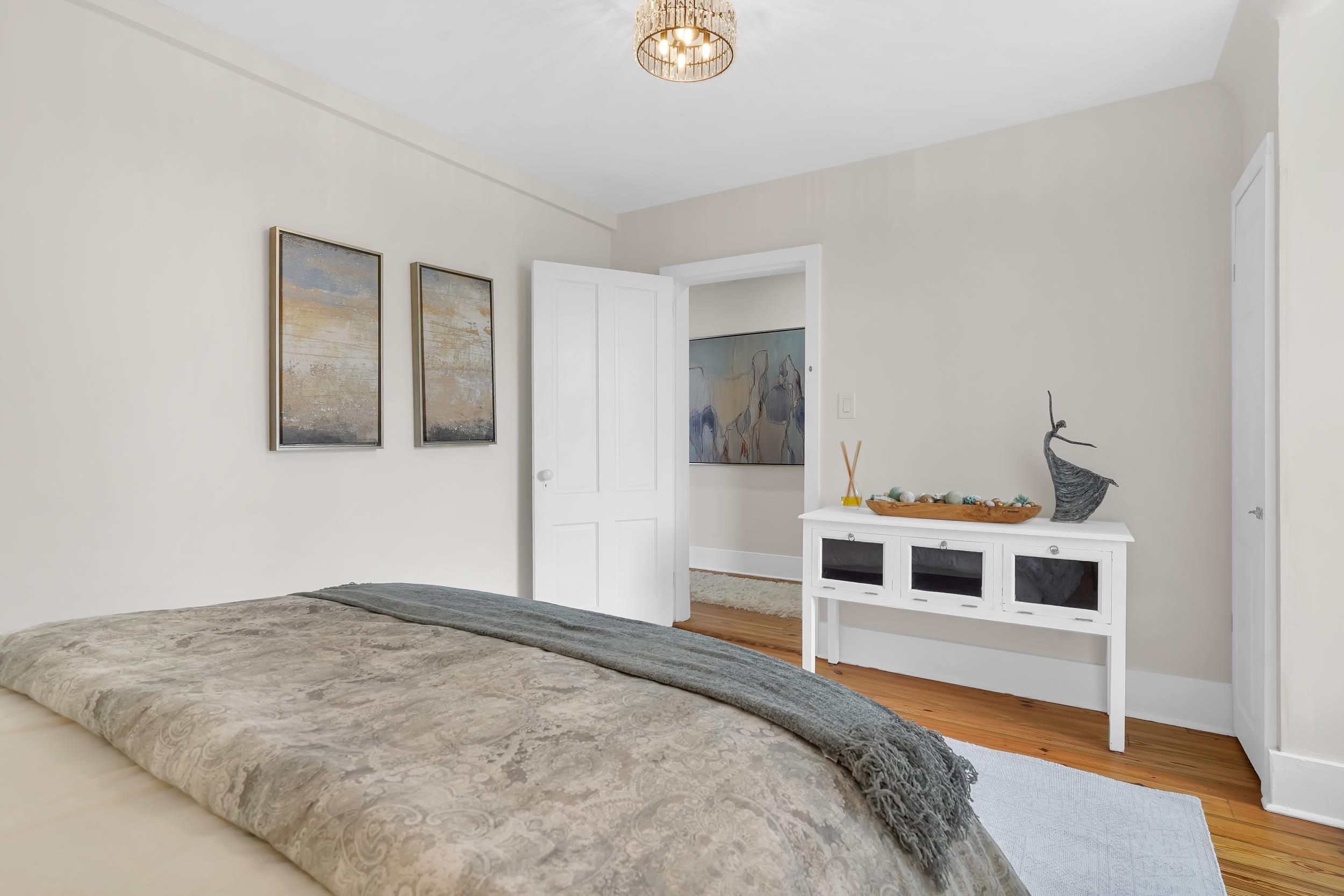 268 St George Street St. Augustine, FL 32084 - Photo 44 of 71 Bedroom featuring light wood-style flooring and baseboards