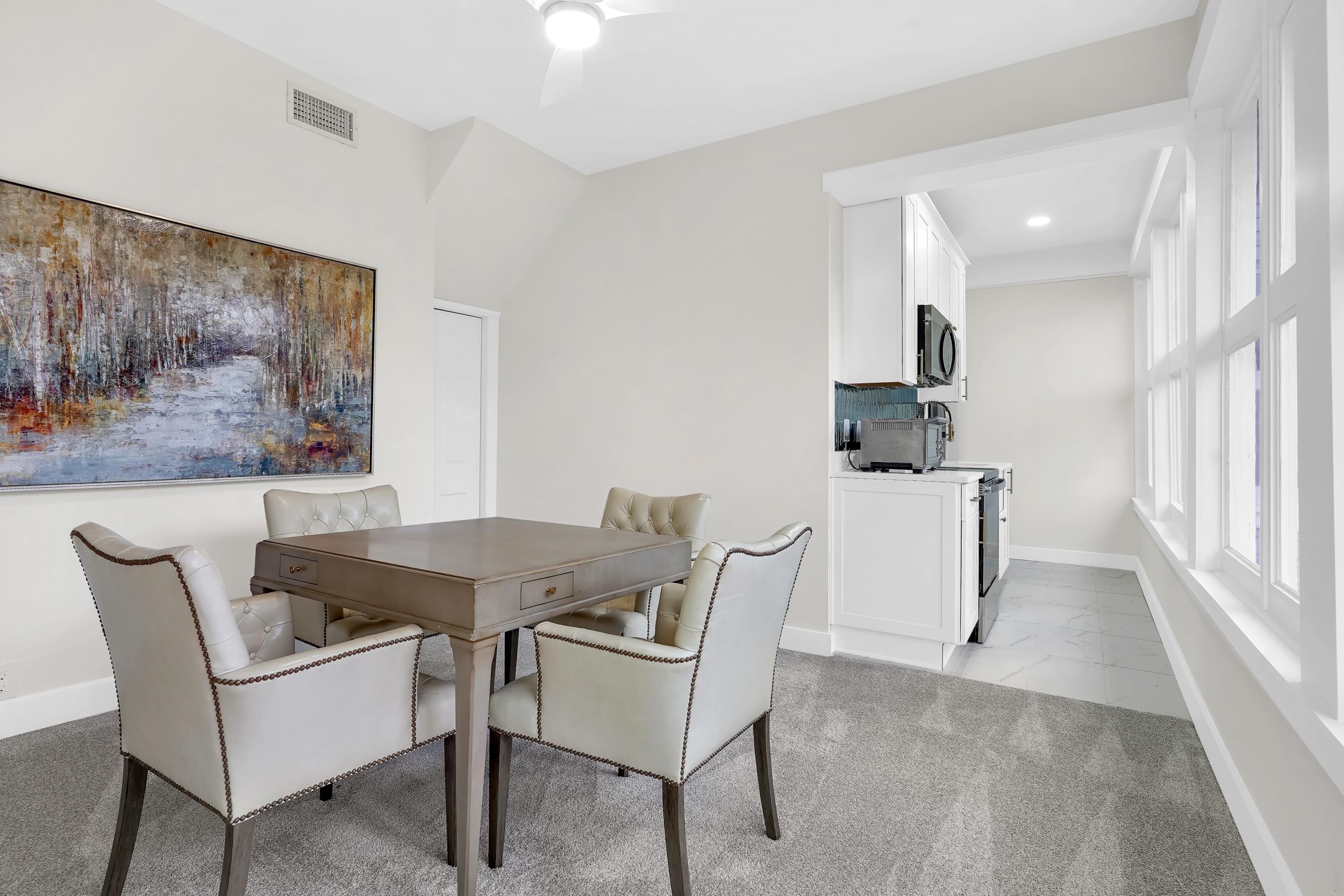 268 St George Street St. Augustine, FL 32084 - Photo 51 of 71 a dining room with furniture and window