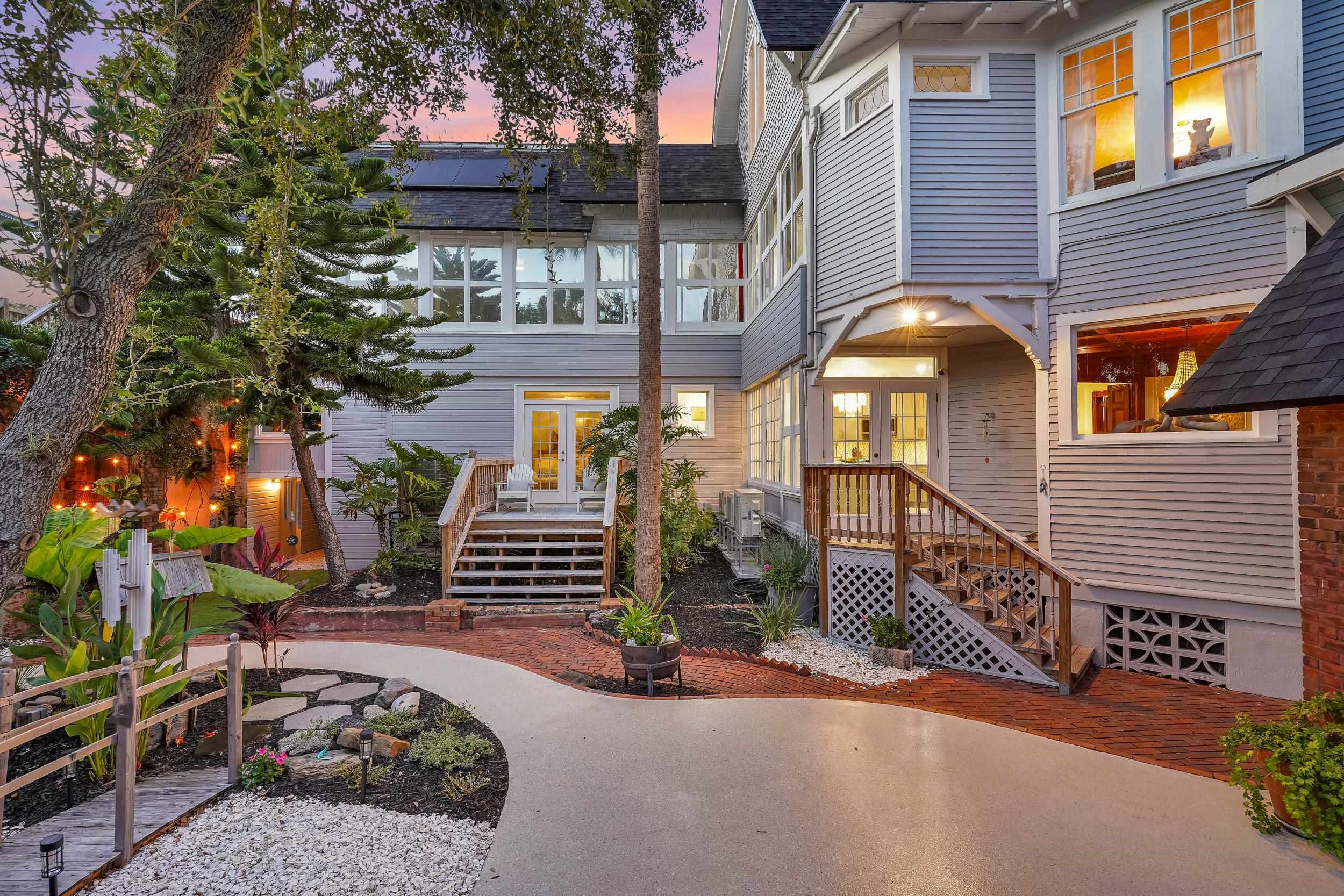 268 St George Street St. Augustine, FL 32084 - Photo 7 of 71 a view of a brick house with many windows
