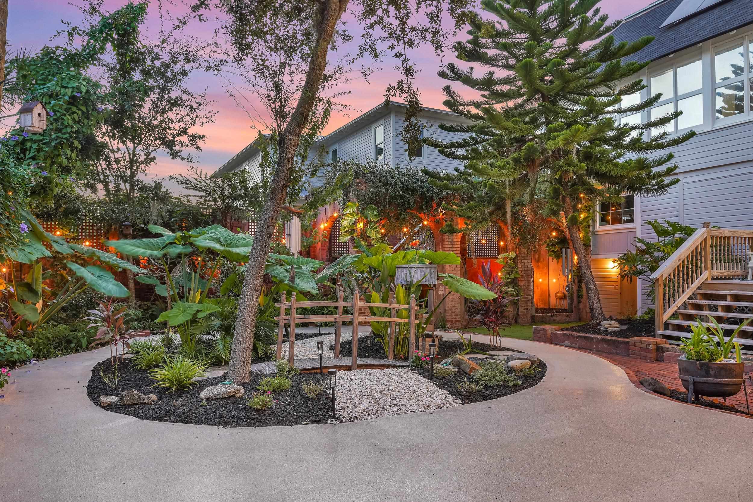 268 St George Street St. Augustine, FL 32084 - Photo 8 of 71 a front view of a house with a yard and a street