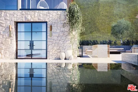 a view of pool with outdoor seating