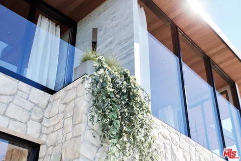 a house with a flower garden