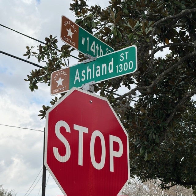 520 West 14th Street Houston, TX 77008 - Photo 18 of 18 a red sign board