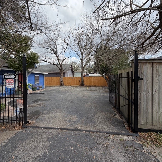 520 West 14th Street Houston, TX 77008 - Photo 3 of 18 a view of a yard with wooden fence