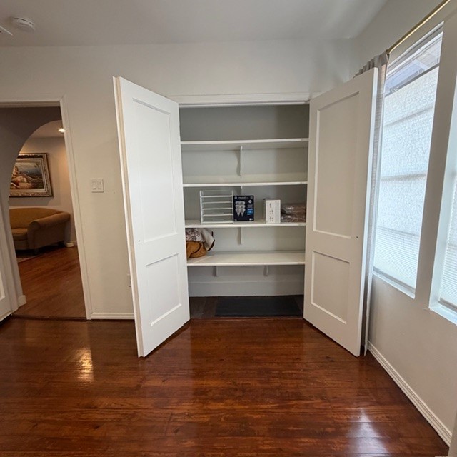520 West 14th Street Houston, TX 77008 - Photo 10 of 18 a storage room with wooden floor