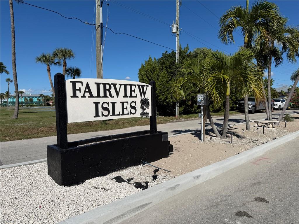 1 Fairview Boulevard Fort Myers Beach, FL 33931 - Photo 11 of 12 a view of a street with potted plants