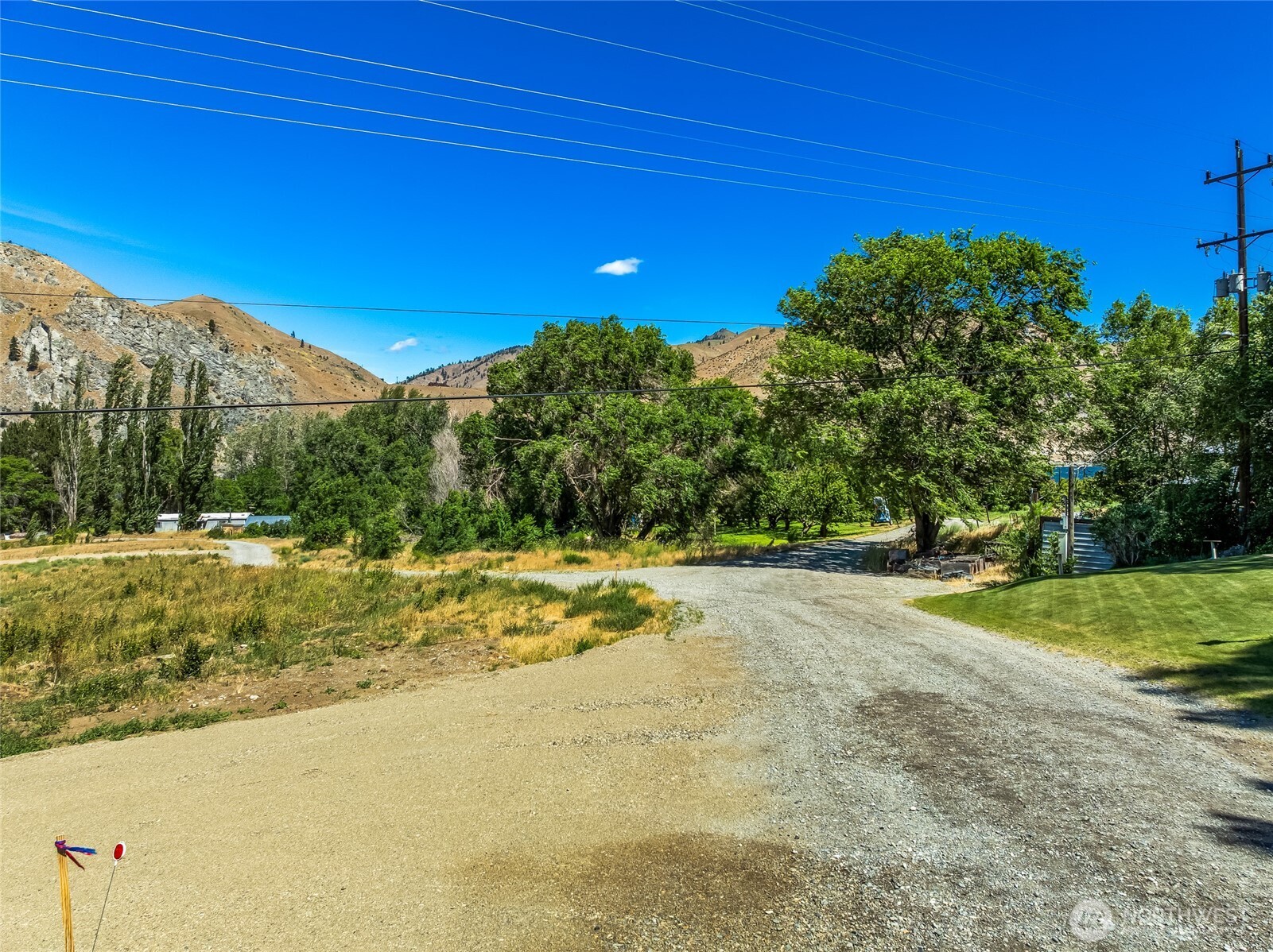 0 Lot 5 Silvest Road Orondo, WA 98843 - Photo 15 of 17 a view of a yard with a house