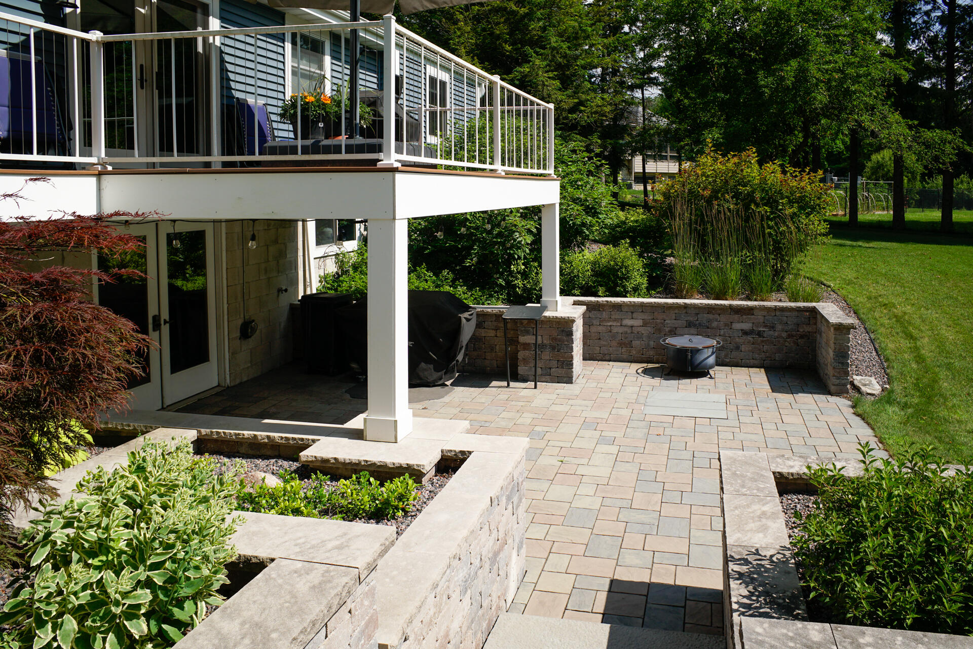 W245N4749 Swan Road Pewaukee, WI 53072 - Photo 28 of 36 Patio landscaping