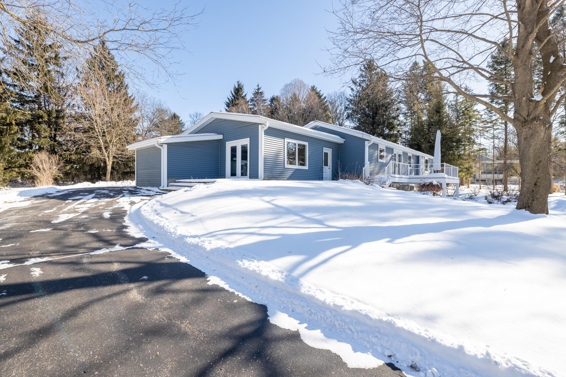 W245N4749 Swan Road Pewaukee, WI 53072 - Photo 31 of 36 Side of house - Winter shot
