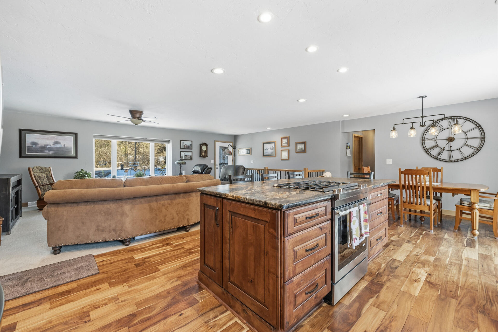 W245N4749 Swan Road Pewaukee, WI 53072 - Photo 36 of 36 Open floor plan - Range in island