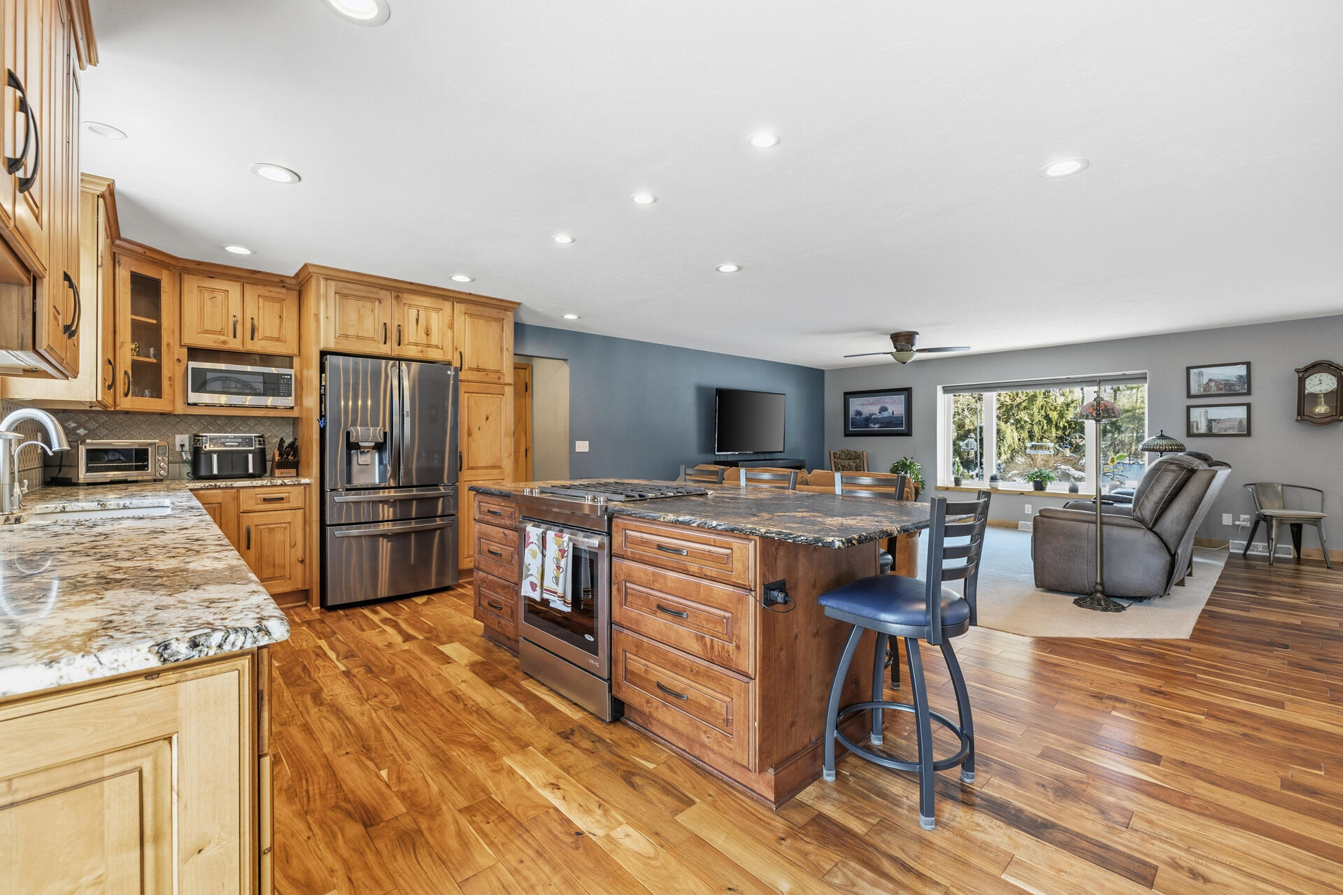 W245N4749 Swan Road Pewaukee, WI 53072 - Photo 8 of 36 Kitchen open to living room
