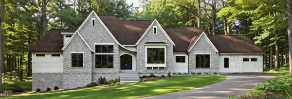 front view of a house with a yard