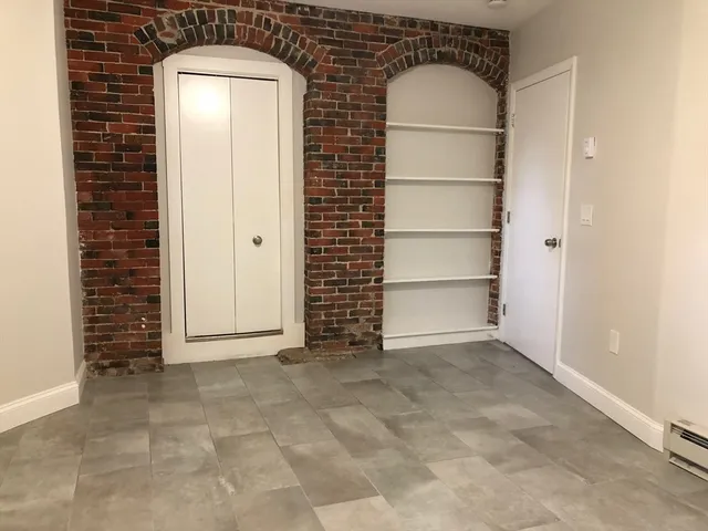 a backyard of a house with wooden deck