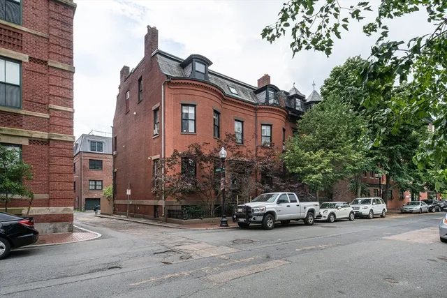 a car parked in front of a building