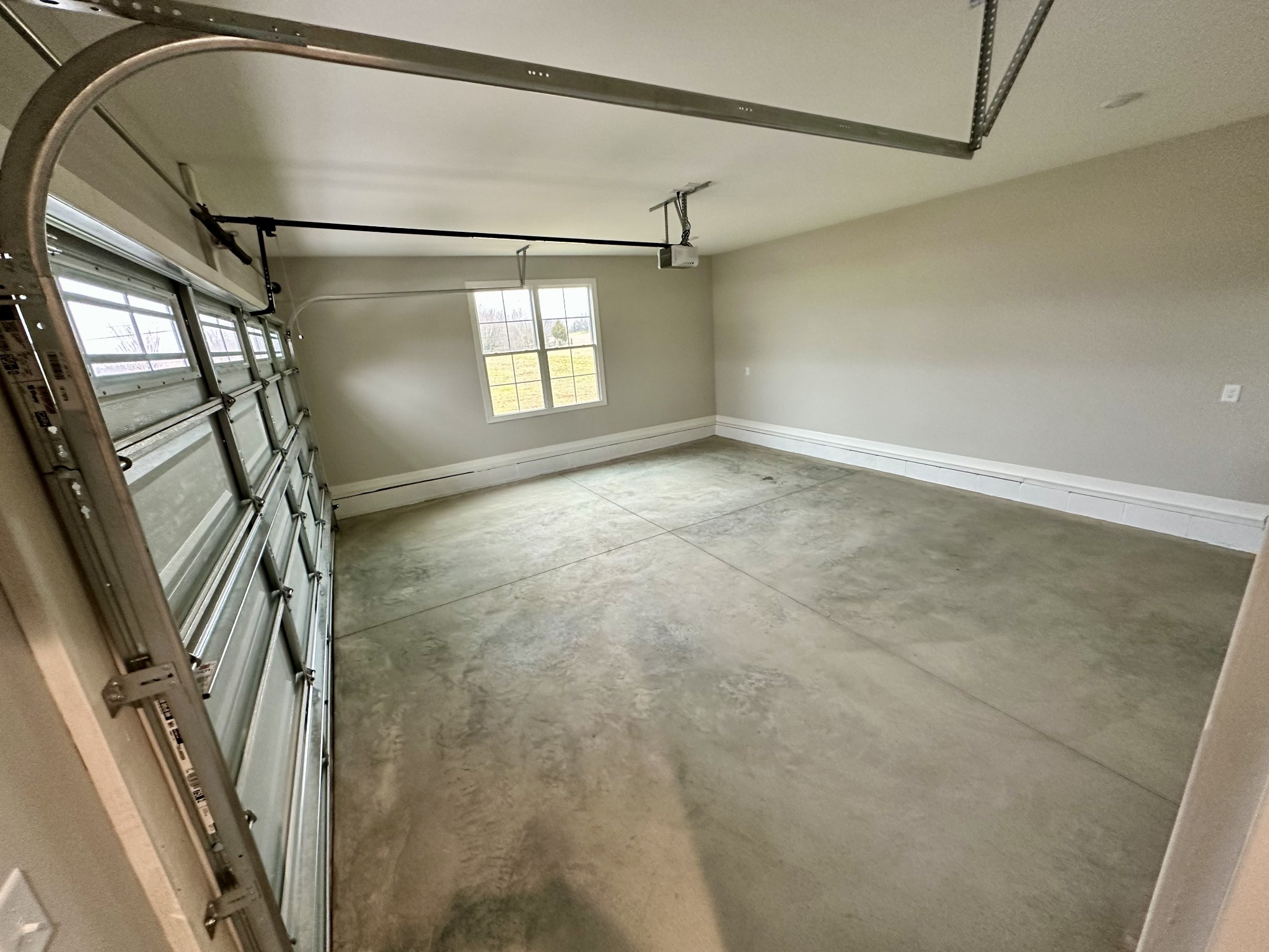 739 Jackson Road, Unit 1 Portland, TN 37148 - Photo 19 of 21 a view of empty room with wooden floor and fan