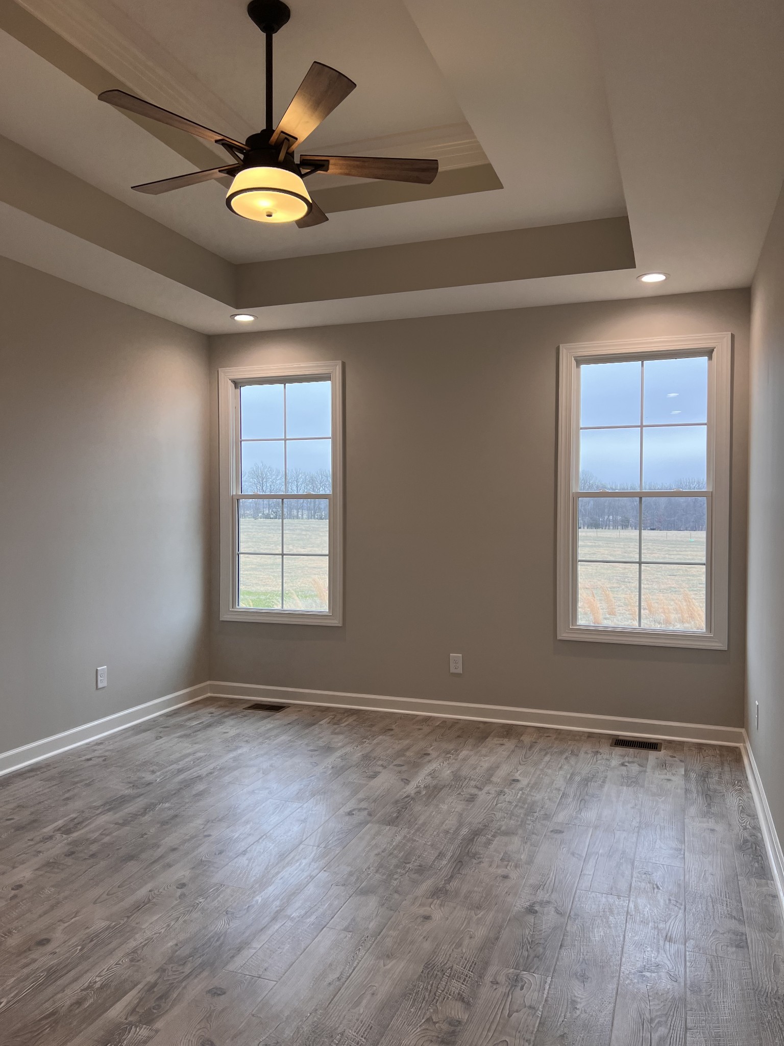 739 Jackson Road, Unit 1 Portland, TN 37148 - Photo 9 of 21 a view of an empty room with window and chandelier fan