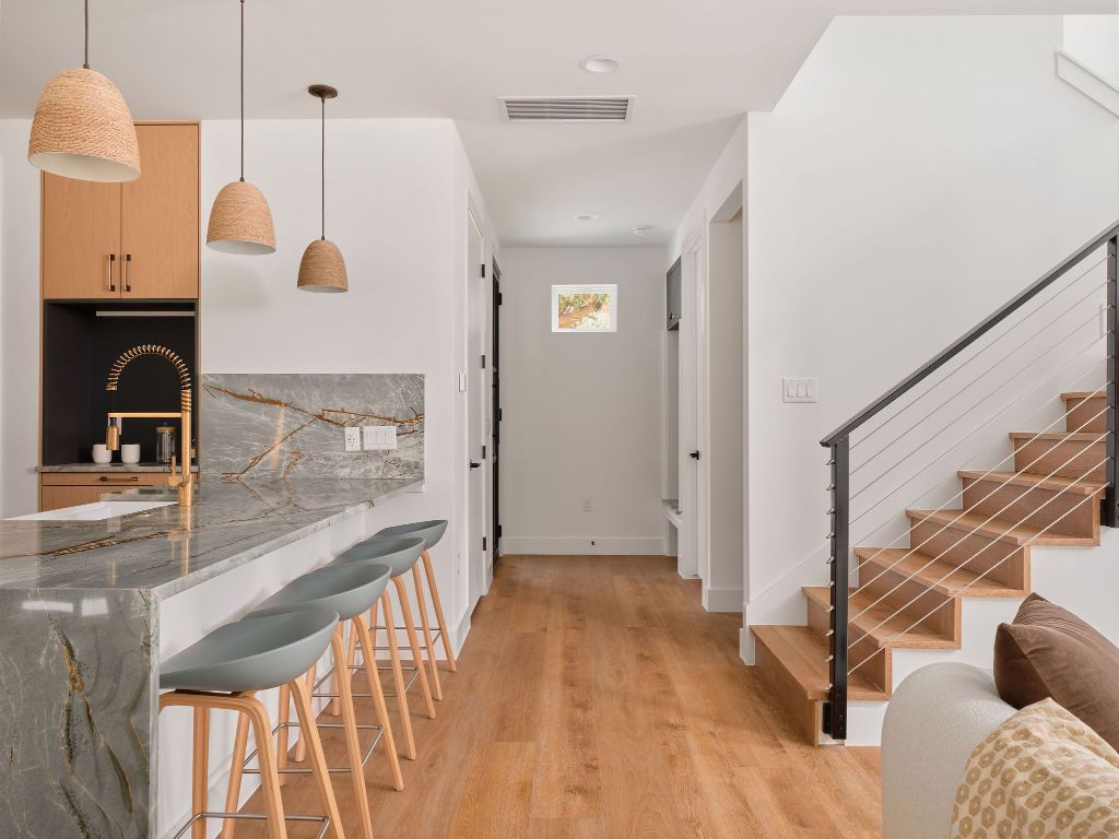 3307 Kay Street, Unit 1 Austin, TX 78702 - Photo 11 of 40 a view of a kitchen with furniture and staircase