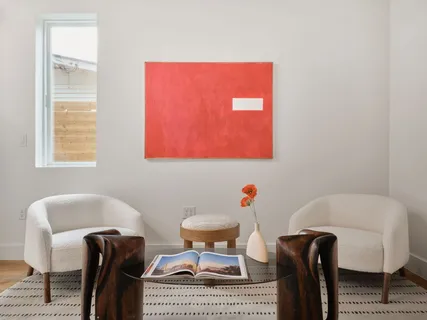 a kitchen with a sink a counter space and stainless steel appliances