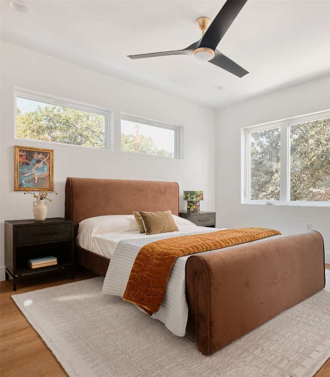 3307 Kay Street, Unit 1 Austin, TX 78702 - Photo 19 of 40 a bedroom with two beds and a large window