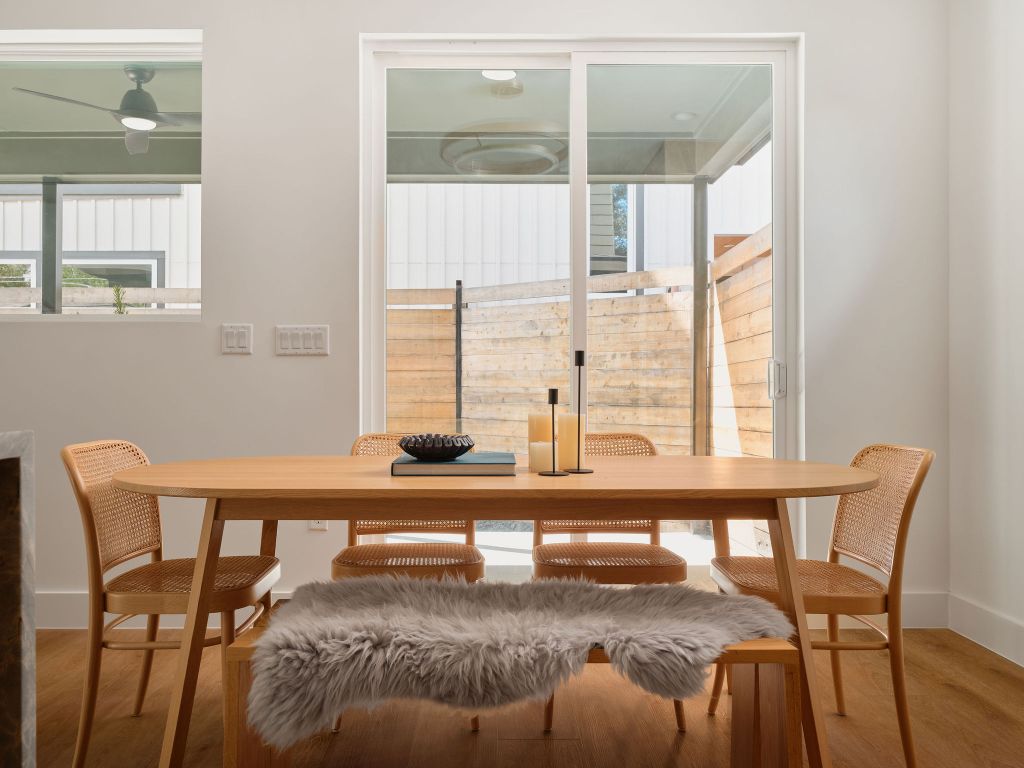 3307 Kay Street, Unit 1 Austin, TX 78702 - Photo 8 of 40 a view of a dining room with furniture and a window