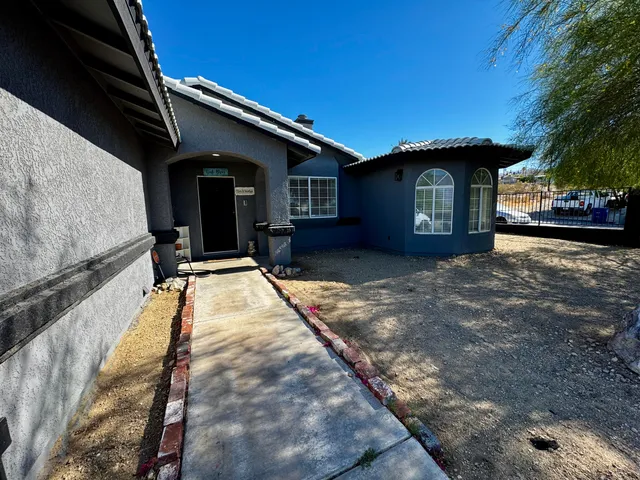 a view of a house with a patio