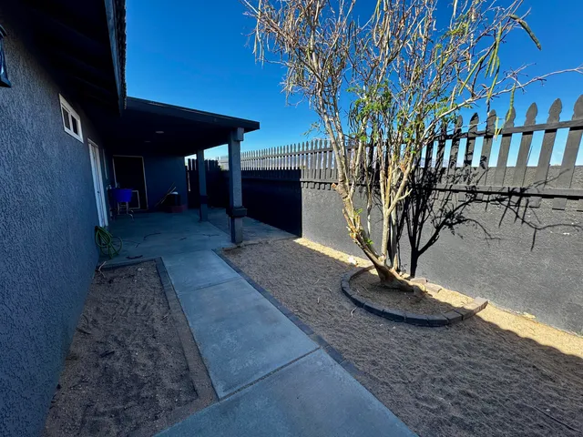 a view of a porch with furniture
