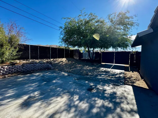 a view of a backyard with green space