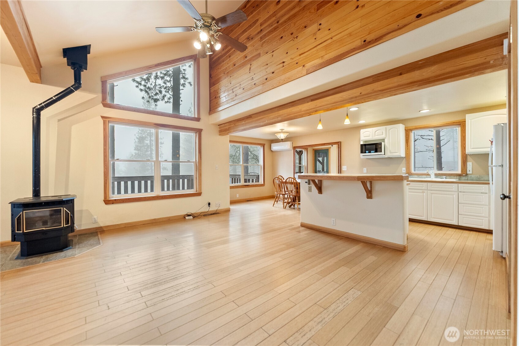 80 Homestead Road Winthrop, WA 98862 - Photo 11 of 40 a view of an empty room with kitchen and a window