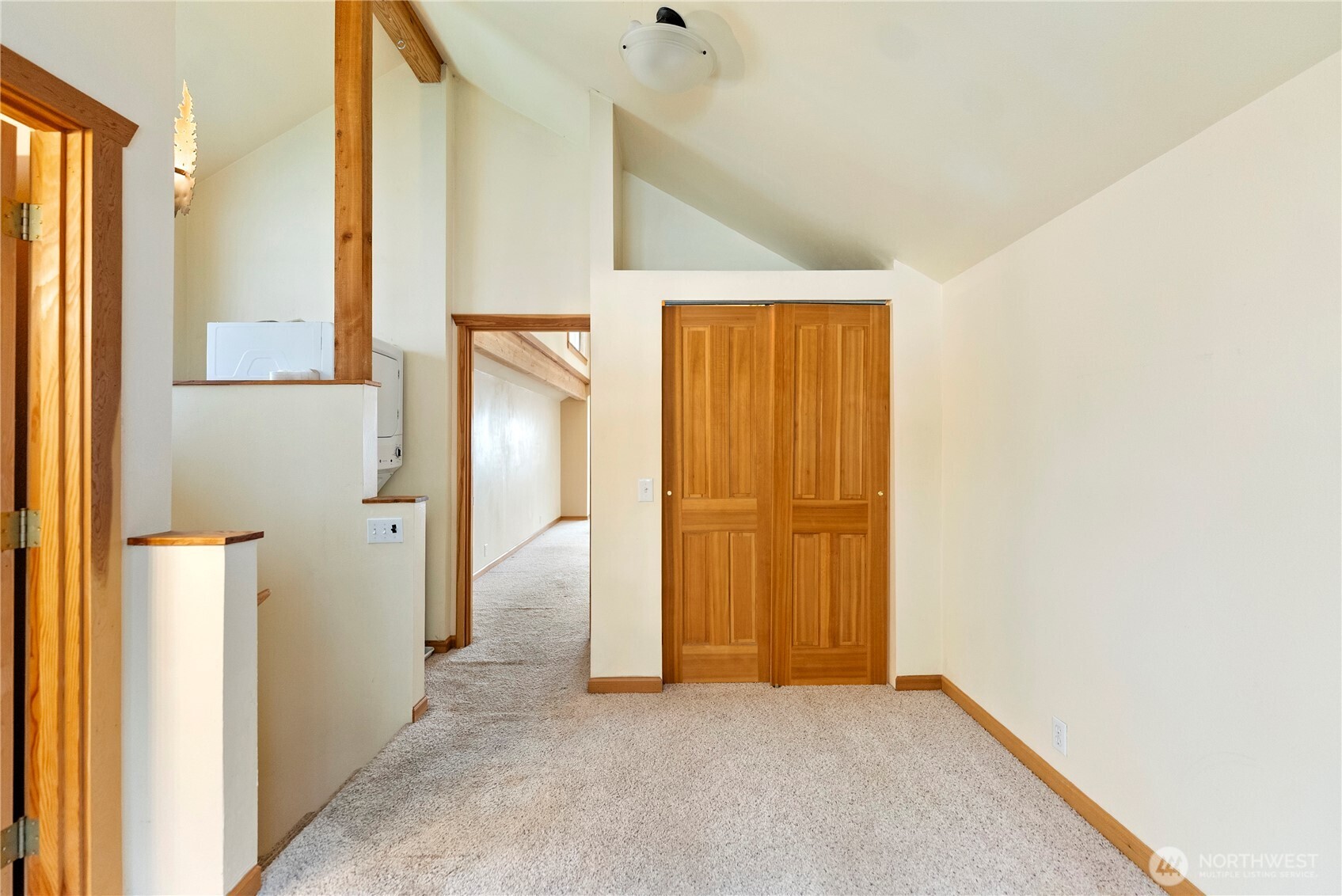 80 Homestead Road Winthrop, WA 98862 - Photo 30 of 40 a view of hallway with wooden floor and a bathroom